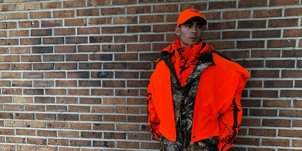 Sitka and LaCrosse image model orange and camo clothing